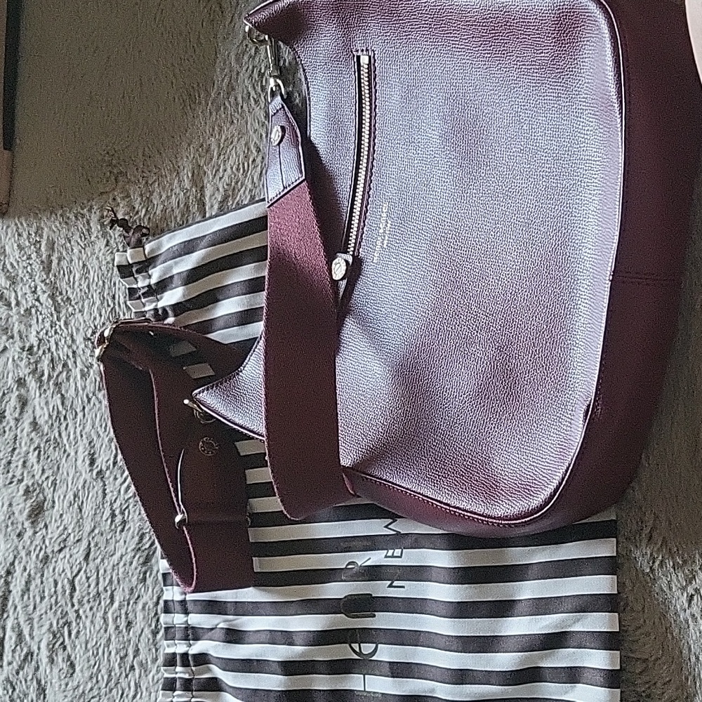 Henri Bendel burgundy bag with cloth bag